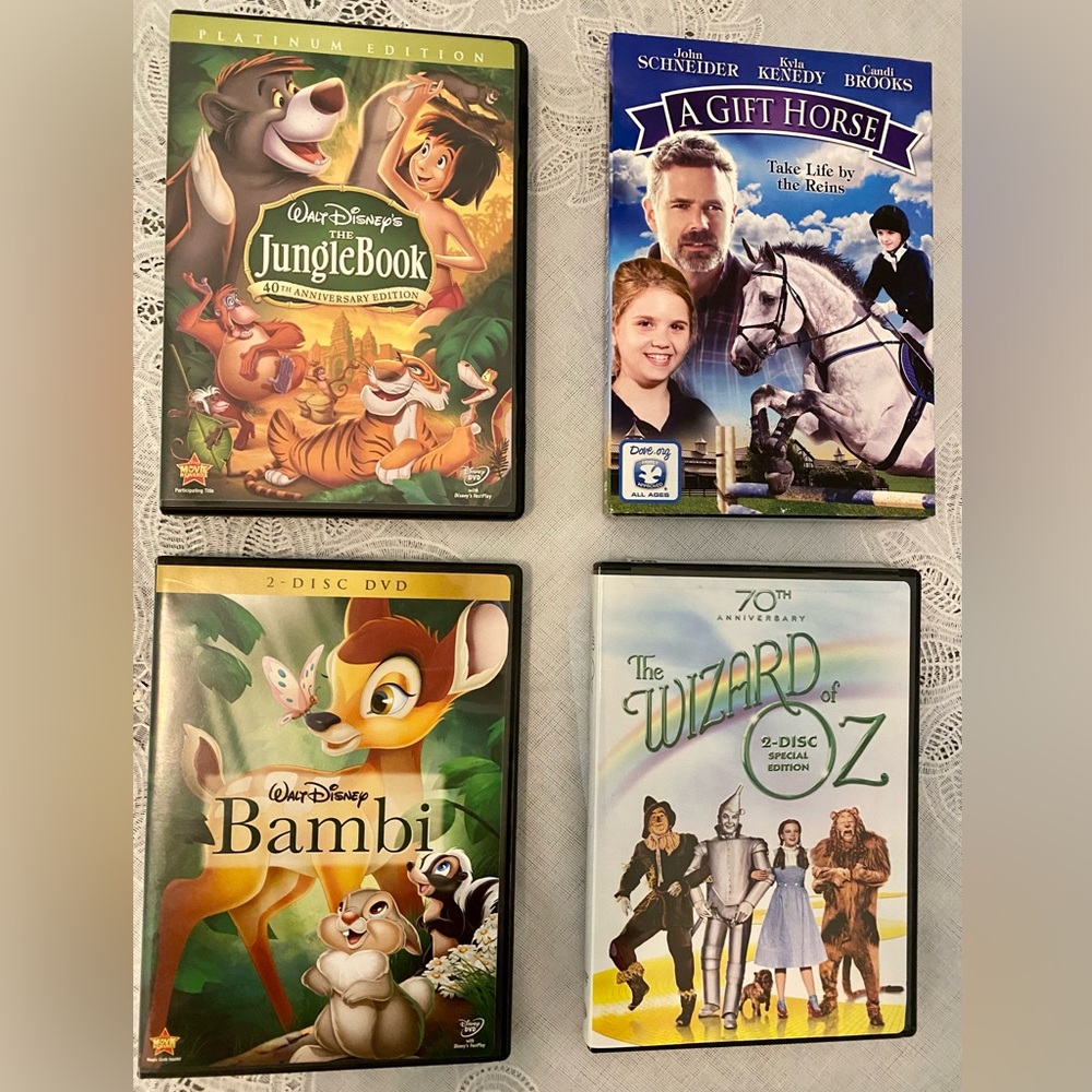 Bundle of 4 G-Rated Movies (2 New and 2 Used)